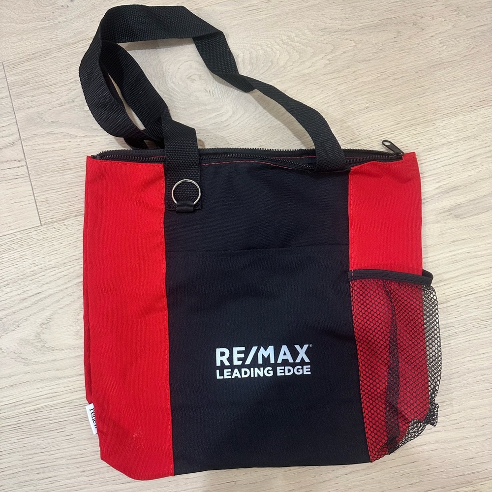 Remax leading edge Tote Bag